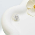 Zilveren holle zirkoon kraal voor DIY sieraden maken op een witte keramische houder - 12mm / Sterling Zilver Kleur
