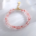 Bracelet bohème en perles rouges translucides texturées avec fermoir en métal doré - Rouge