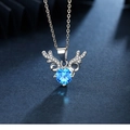 Detail of deer antler necklace with large blue zircon inlay on navy textured background - Pendant Only (No Chain) / Blue
