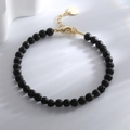 Chic black lava stone beaded bracelet with elegant gold lobster clasp and round tag charm - Black Lava Stone Bracelet