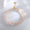 Bracelet bohème avec perles roses et jaunes translucides et fermoir mousqueton doré - Jaune-Rose
