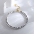 Minimalist white marble bead bracelet with gold lobster clasp and round gold tag - White Turquoise Bracelet