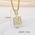 Detail view of gold letter N pendant with zircon stones showing dimensions 3.4cm by 1.7cm - N Style - Gold (Pendant And Rope Chain)