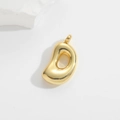Detail shot of a golden balloon-style alphabet D pendant with a mirror finish - Small Letter Pendant / Letter D