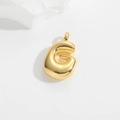 Polished gold bubble letter G pendant with glossy mirror finish on a clean white background - Letter G