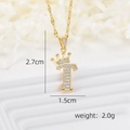 Detailed view of gold crown initial T necklace with zircon measurements 2.7cm by 1.5cm - Gold T