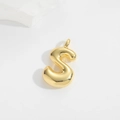 Macro detail of high-polished gold balloon letter S pendant with mirror finish - S