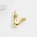 Detailed view of a puffy gold balloon-style letter V pendant with a polished shiny finish - Letter V