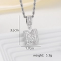 Macro detail of silver M initial pendant with cubic zirconia and dimensions 3.3x1.7cm - M Style - Silver (Pendant And Rope Chain)