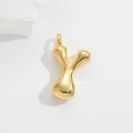 Detailed view of the gold puffy 3D alphabet Y bubble letter pendant on white stone - Large Letter Pendant / Gold-Y