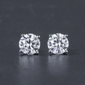 Detailed view of round brilliant-cut micro-pave cubic zirconia earrings in four-prong setting - 4-Prong 4mm