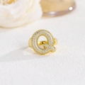 Close-up of golden balloon letter Q ring with sparkling micro-pave cubic zirconia - Letter Q