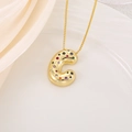 Macro view of a 3D gold letter C pendant with colorful zircon stones on a box chain - Pendant Only / Letter C