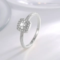 Silver halo ring with square-cut main stone and milgrain detail on polished band - Silver With White Zirconia