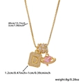 Detail of square letter D pendant with pink heart planet on a gold box chain necklace - Box Chain / Gold D