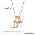 Detail of 18k gold plated letter D pendant with pink heart stone and crown accents - Gold Letter D Style