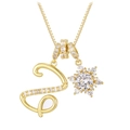 Detailansicht einer Goldkette mit einem Zirkonia-S-Anhänger und einem Schneeflocken-Charme - 18K-Gold / Gold Z (anhänger + Goldene Boxkette)