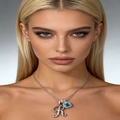 Detailed close-up of a silver necklace featuring a zircon letter R and blue square pendant - Silver R
