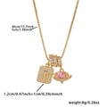 Detail view of gold box chain necklace with zircon letter R and pink heart planet pendant - Box Chain / Gold R