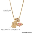 Detail of gold box chain necklace with zircon letter U and pink heart gemstone pendant - Box Chain / Gold U