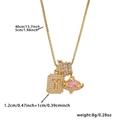 Detail view of 40cm gold necklace with zircon square letter Y and pink heart charms - Box Chain / Gold Y