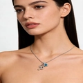 Letter B necklace with blue square gemstone pendant worn by model on neck - Silver B
