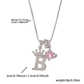 Detail of pink heart zircon pendant and silver letter B with crown on box chain - Silver Letter B Style