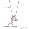 Letter E necklace with silver crown, pink heart gemstone and sparkling square chain link - Silver Letter E Style