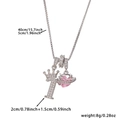 Silver crown necklace featuring a pink heart stone and zircon numeral one pendant - Silver Letter T Style