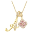 Detail of golden clover pendant with pink gemstones and diamond-set letter A - Letter A / Gold