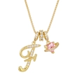 Detailed close-up of gold box chain featuring a zircon letter F and pink heart planet pendant - Letter F / Gold