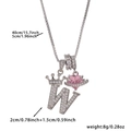 Macro detail of silver crown letter W pendant with pink heart and dimensions shown - Silver Letter W Style