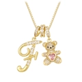 Detail of bear pendant with pink heart and pavé crystal letter F on gold box chain - Gold F