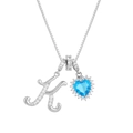 Macro view of silver necklace with blue heart gemstone and zircon-paved K letter - Silver Tone Letter K Style
