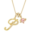 Detail of gold letter P pendant and pink heart planet charm on a dainty chain - Letter P / Gold