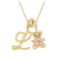 Detail of gold box chain with letter L pendant and crystal bear with pink heart - Gold L