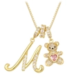 Detail of letter M pendant with iced-out teddy bear and pink heart stone on gold necklace - Gold M