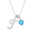 Macro shot of silver letter F pendant with blue heart gemstone and box chain - Silver Tone Letter T Style