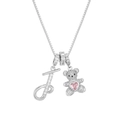 Macro shot of silver letter J pendant and diamond teddy bear with pink heart jewel - Silver J
