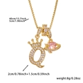 Detail of gold letter Q crown pendant with pink stone planet charm on a delicate chain - Gold Letter Q Style