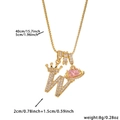 Detail of gold letter W crown pendant with pink heart Saturn charm and box chain - Gold Letter W Style