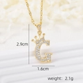 Detail of 18k gold plated crown letter G pendant necklace with micro-pave cubic zirconia - Gold G