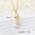 Macro shot of 18k gold plated letter I crown pendant with dimensions 2.8cm by 1.3cm - Crown Letter I Necklace / Gold