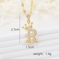 Macro detail of gold crown letter R pendant with cubic zirconia and size dimensions - Pendant With Lip Chain / Letter R