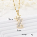 Detail view of 18k gold plated crown letter Z pendant with micro inlaid zircon stones - Gold Z