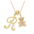 Golden box chain necklace featuring sparkling letter R and crystal bear pendant - Gold R