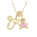 Golden necklace with crystal bear pendant holding a pink heart and sparkling letter - Letter V / Gold
