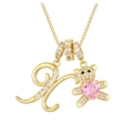 Gold-tone necklace featuring letter K pendant with diamond bear holding pink heart stone - Letter X / Gold
