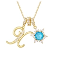 Detailed shot of letter K gold pendant with snowflake blue zircon and white diamonds - Gold - Letter X