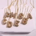 Detail of diverse 26 English balloon letter pendants with micro-pave cubic zirconia stones - Letter A / Gold